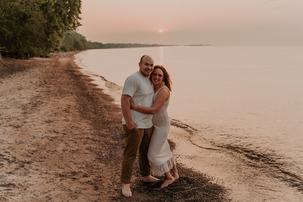 Stephen and Malayna on a beach in Rochester